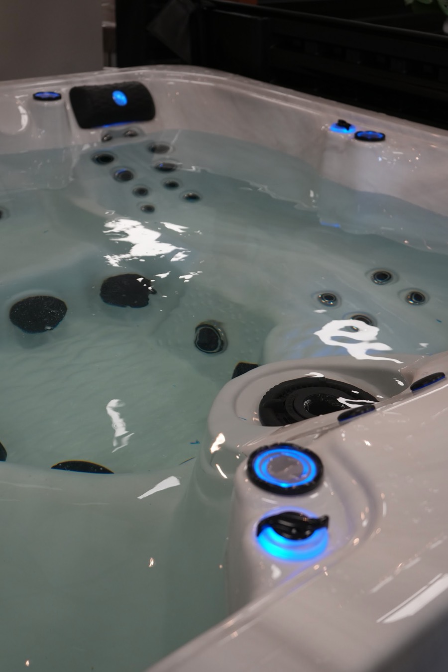 Hot tub running on the McAndrew showroom floor with jets and LED lighting on